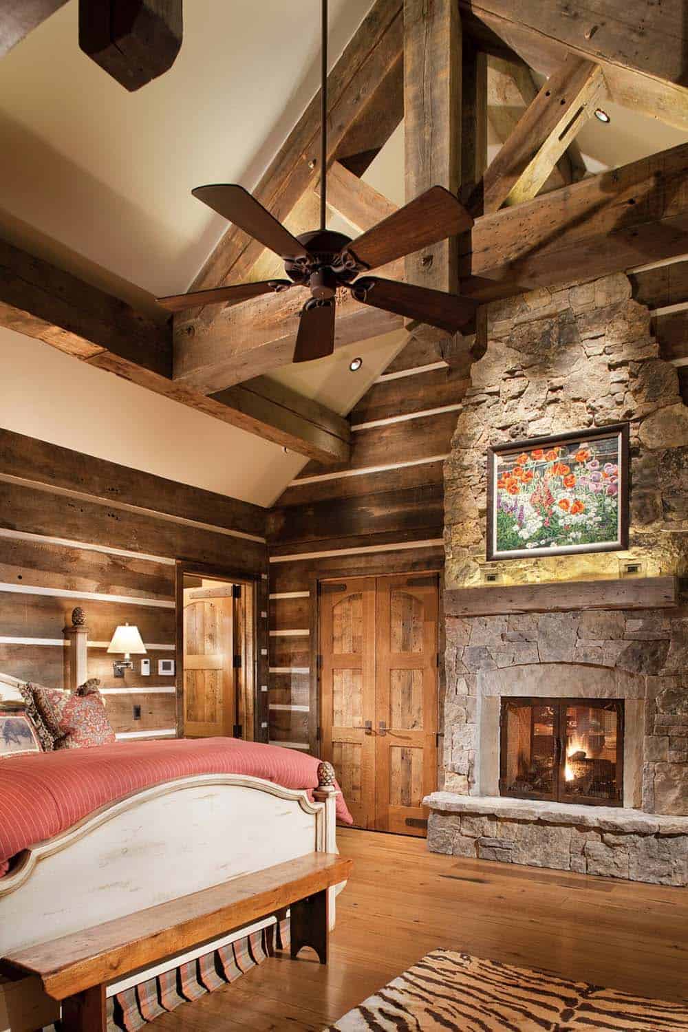 rustic bedroom with a fireplace