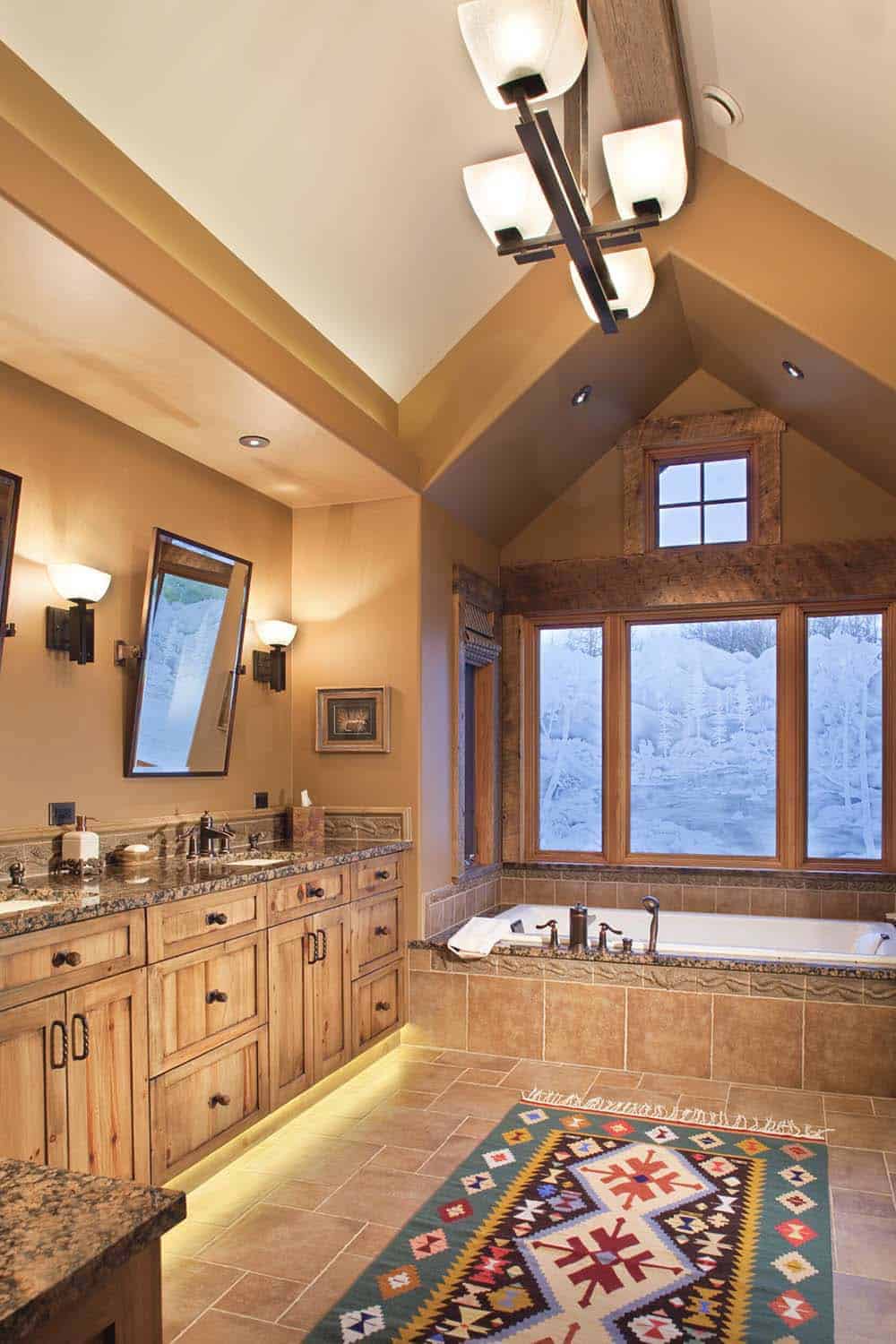 rustic bathroom with an integrated tub and large window