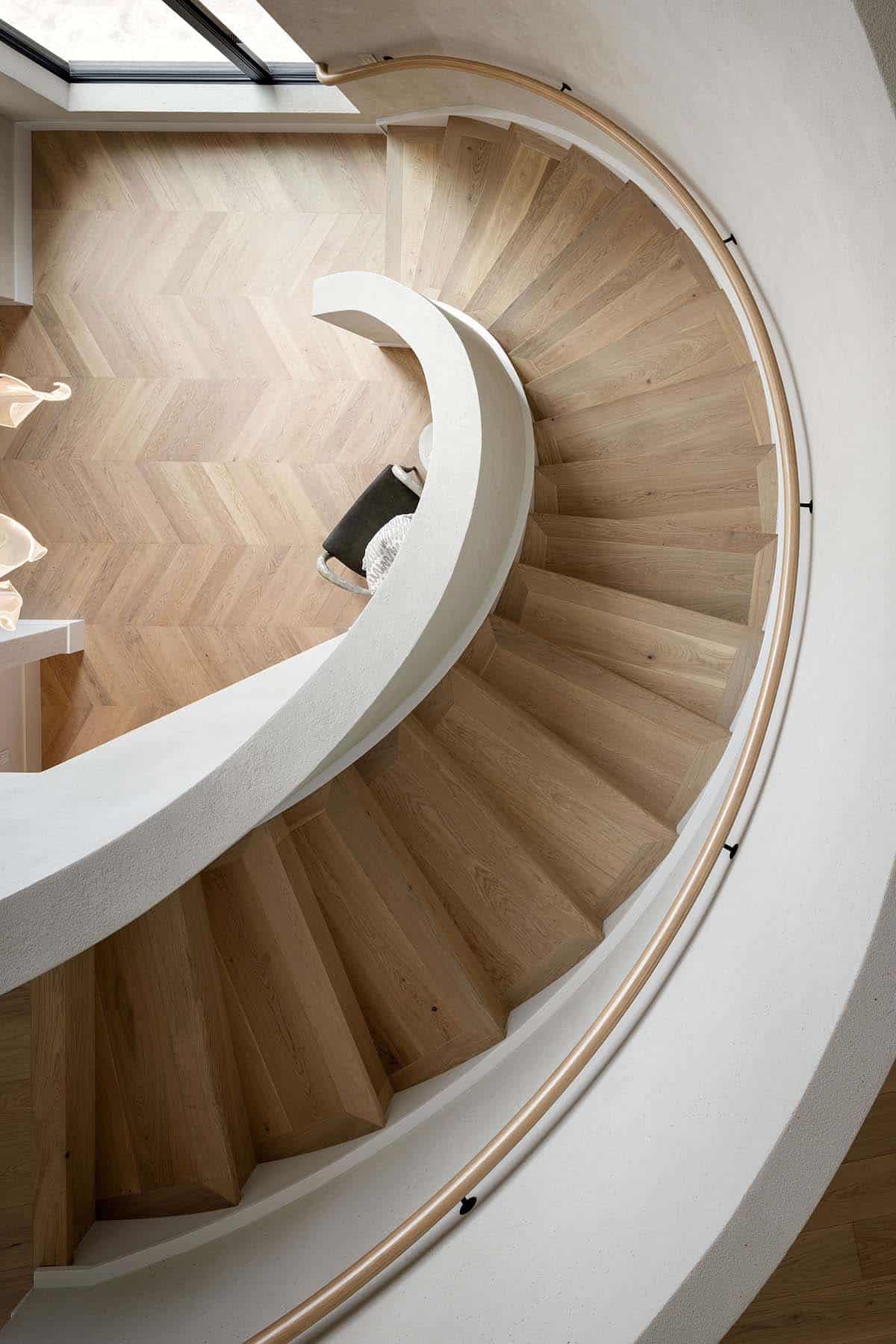 minimalistic japanese inspired curved staircase