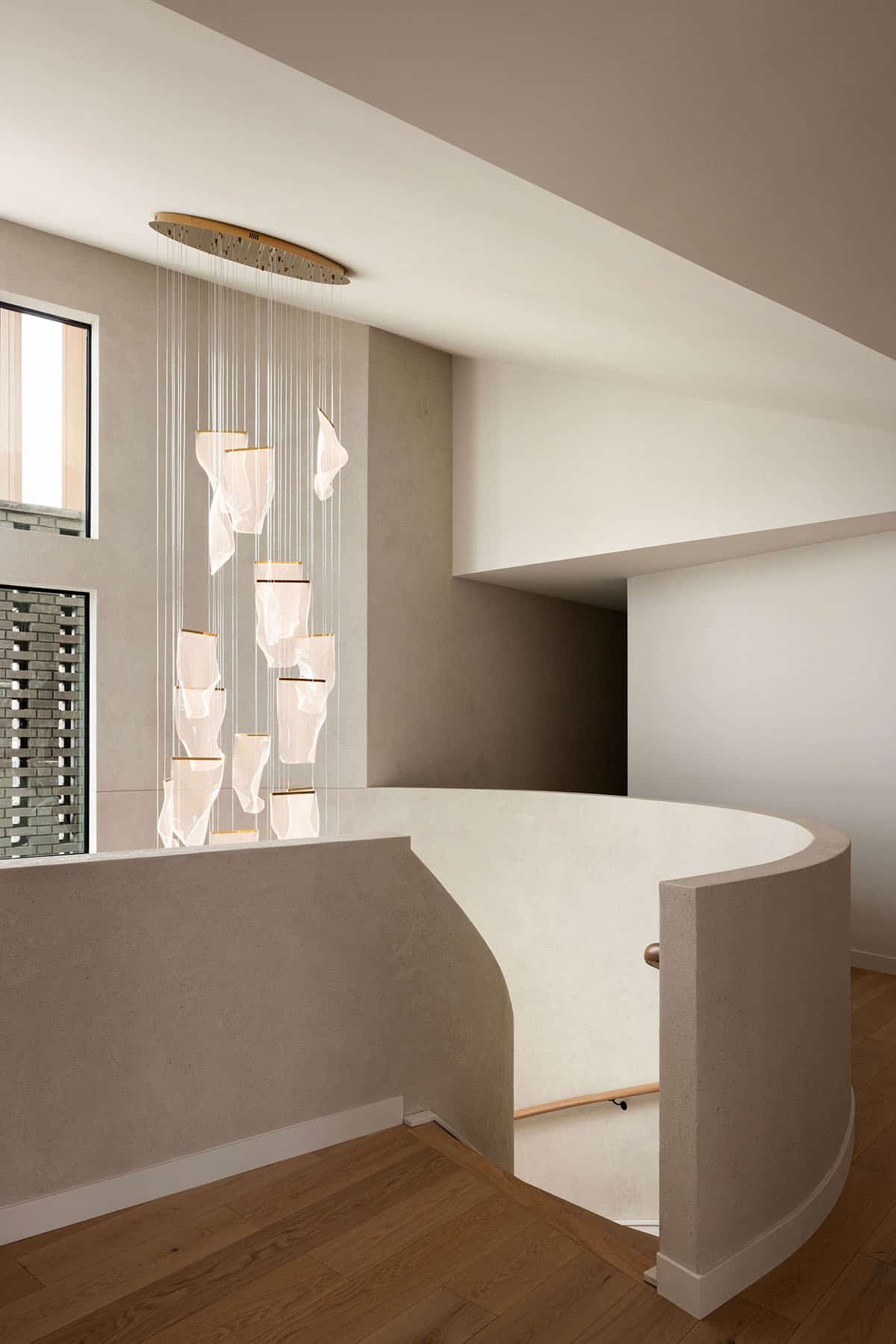 minimalistic japanese inspired curved staircase