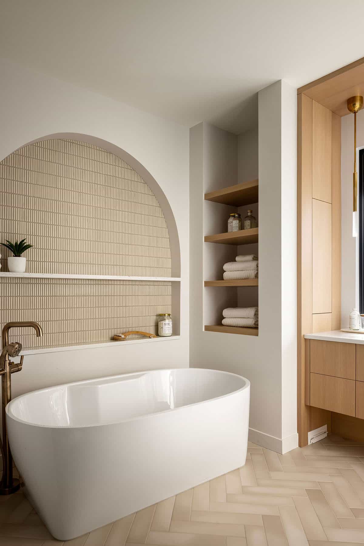 minimalistic japanese inspired bathroom with a freestanding tub