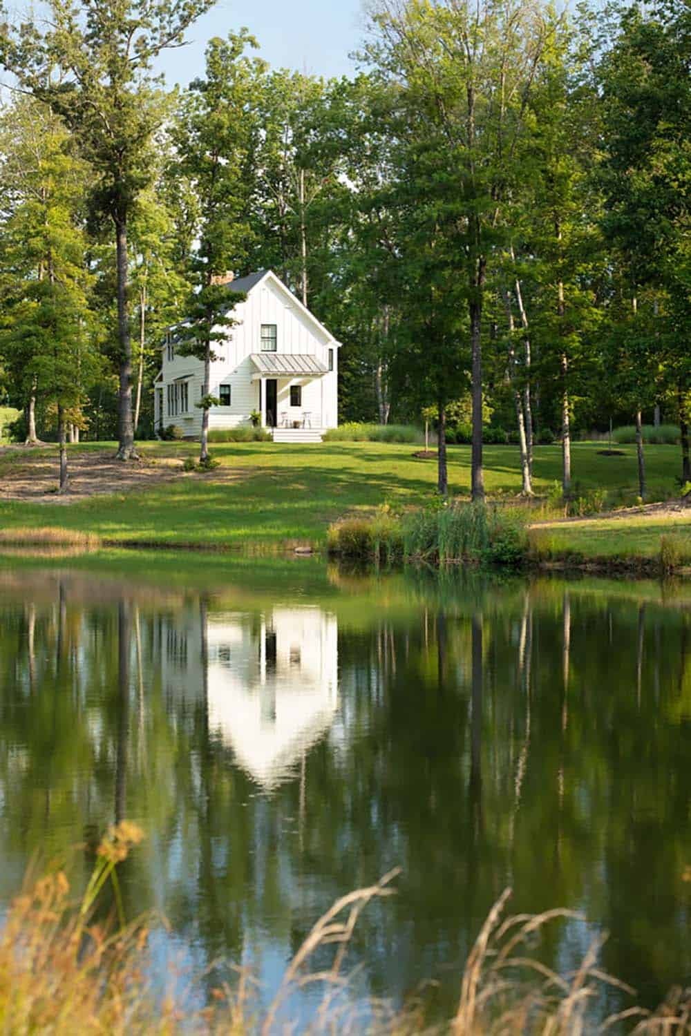 modern farmhouse exterior with a water view