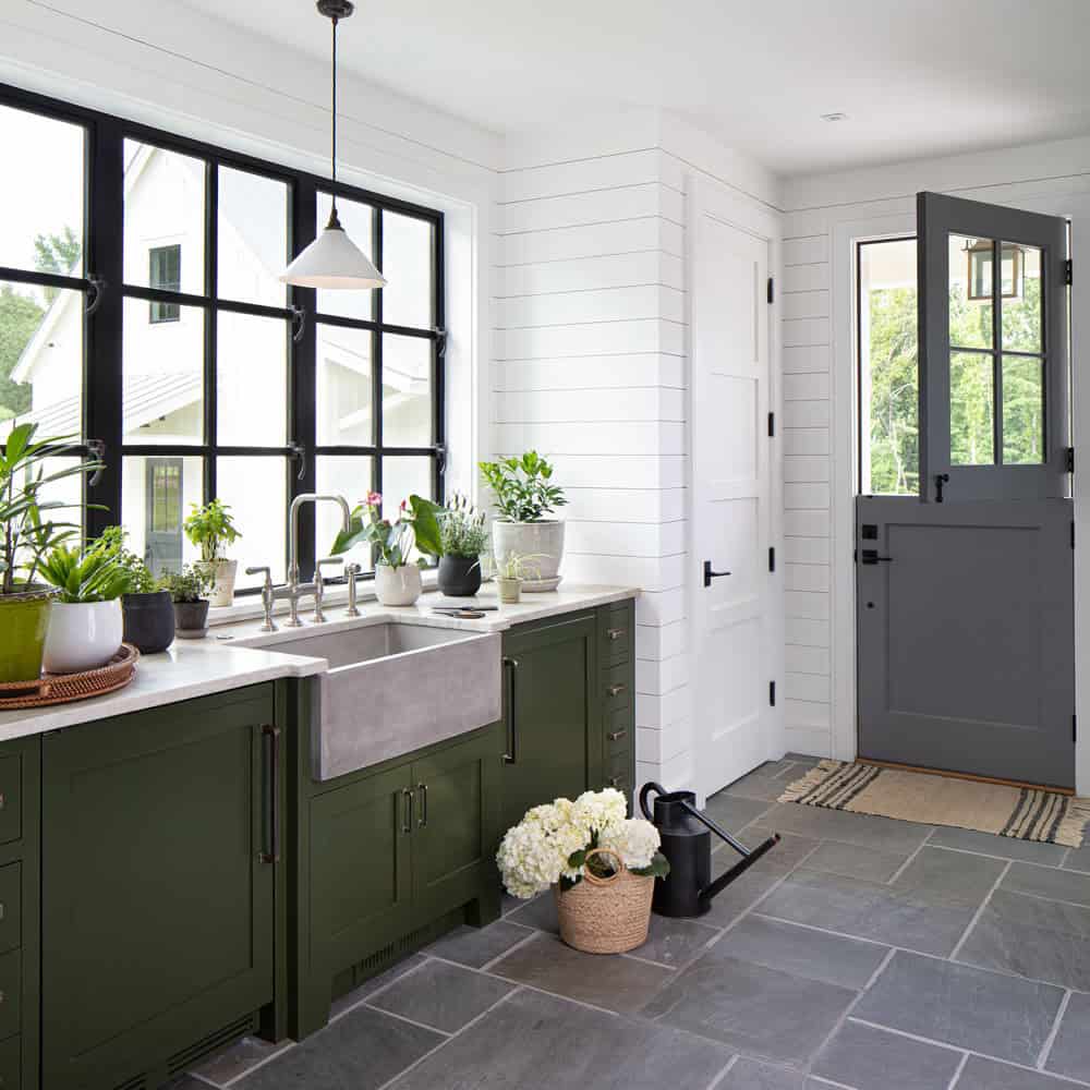 modern farmhouse mudroom with a sink