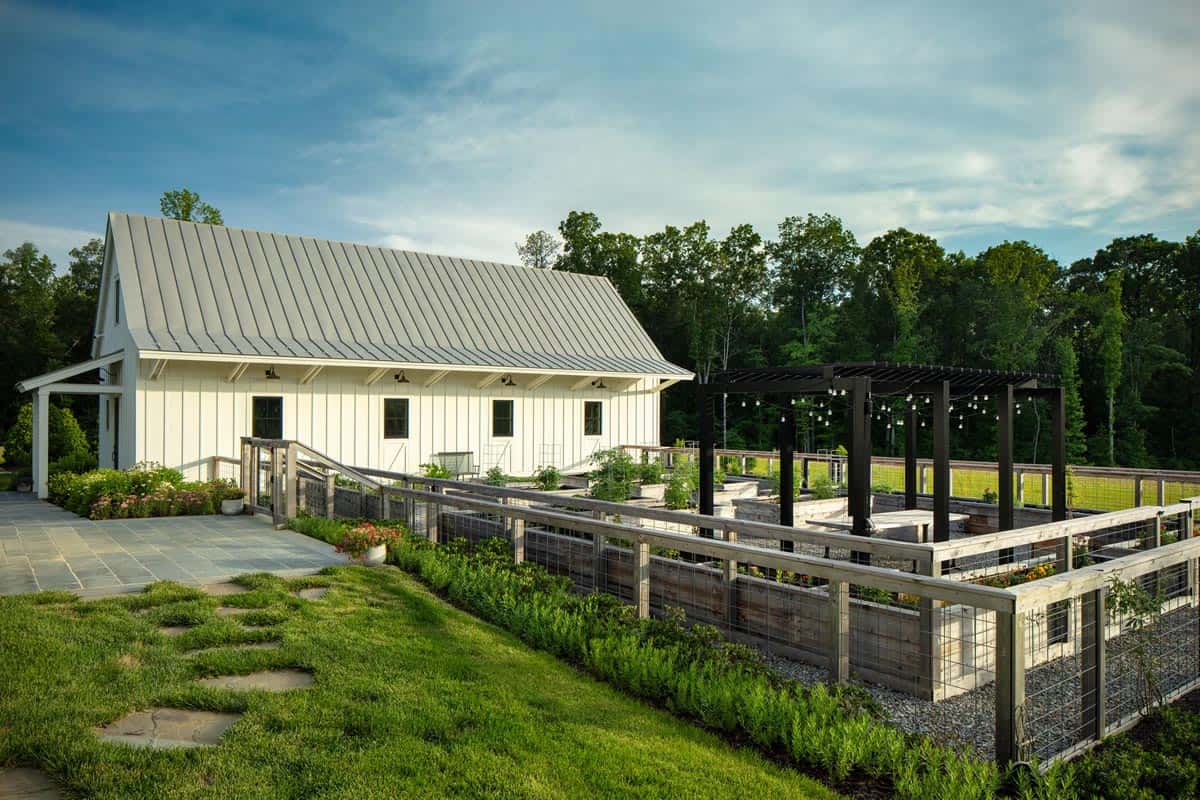 modern farmhouse exterior with a raised vegetable garden