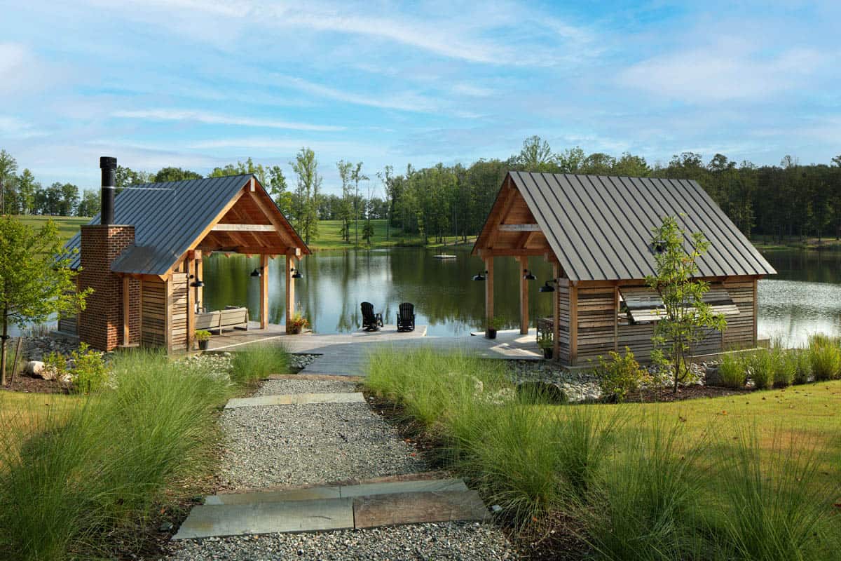 modern farmhouse exterior with a lakeside dock