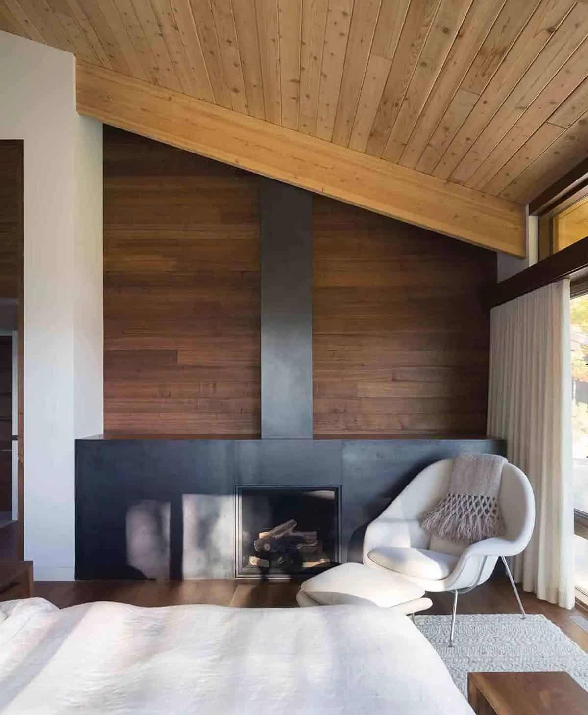 modern bedroom with a fireplace
