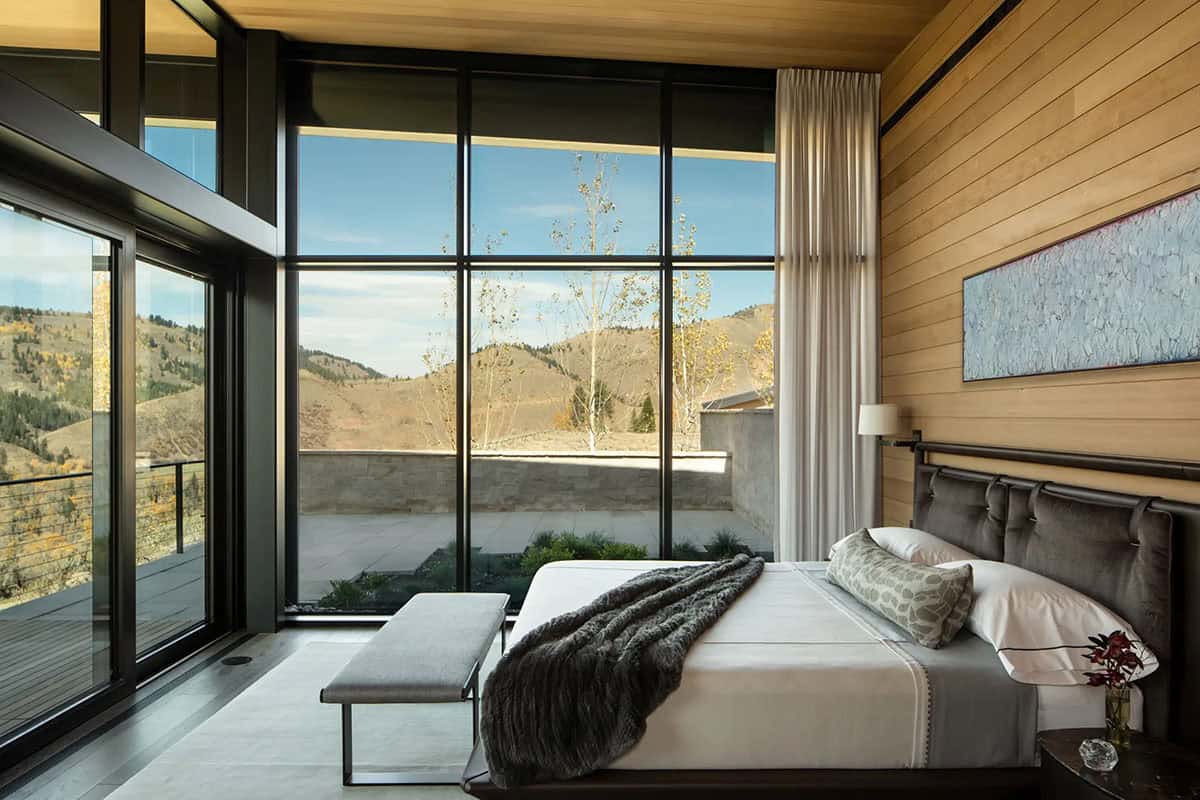 modern bedroom with large windows