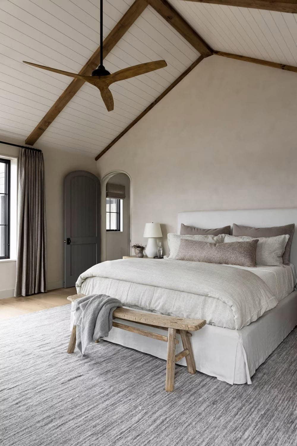 modern bedroom with a vaulted ceiling