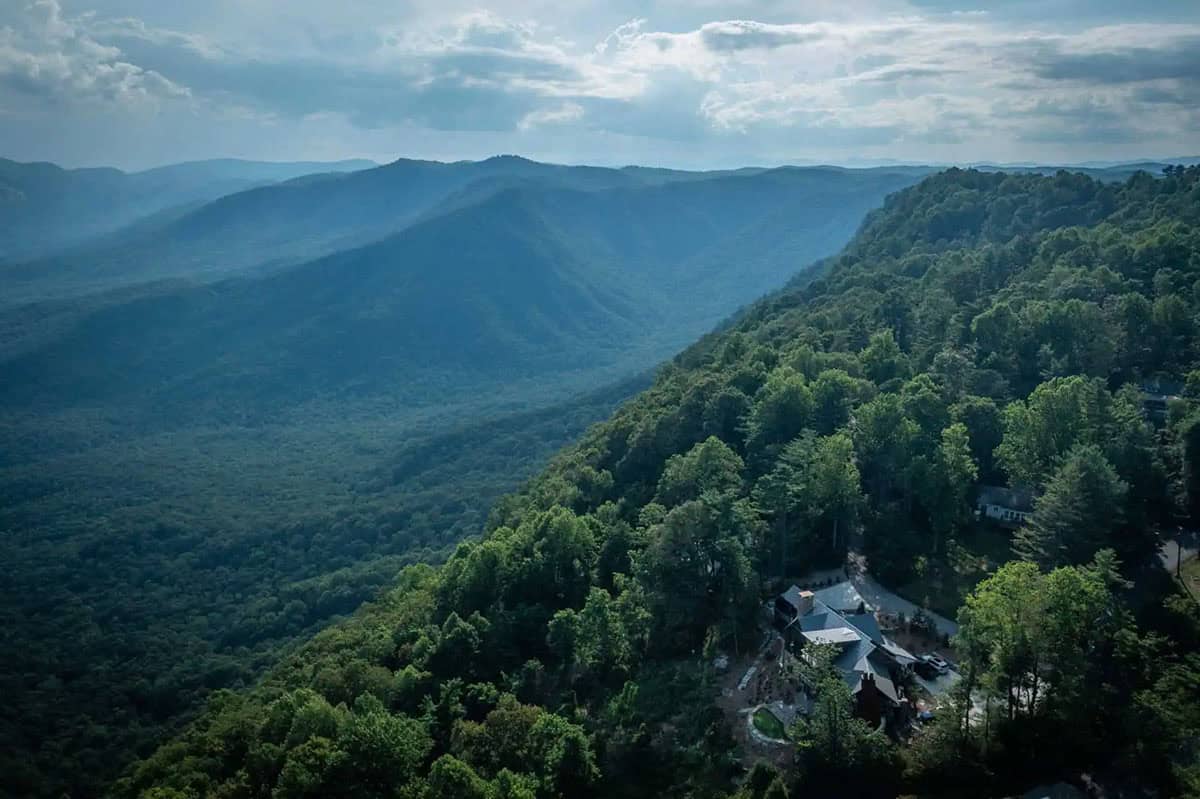 modern rustic mountain house exterior aerial view