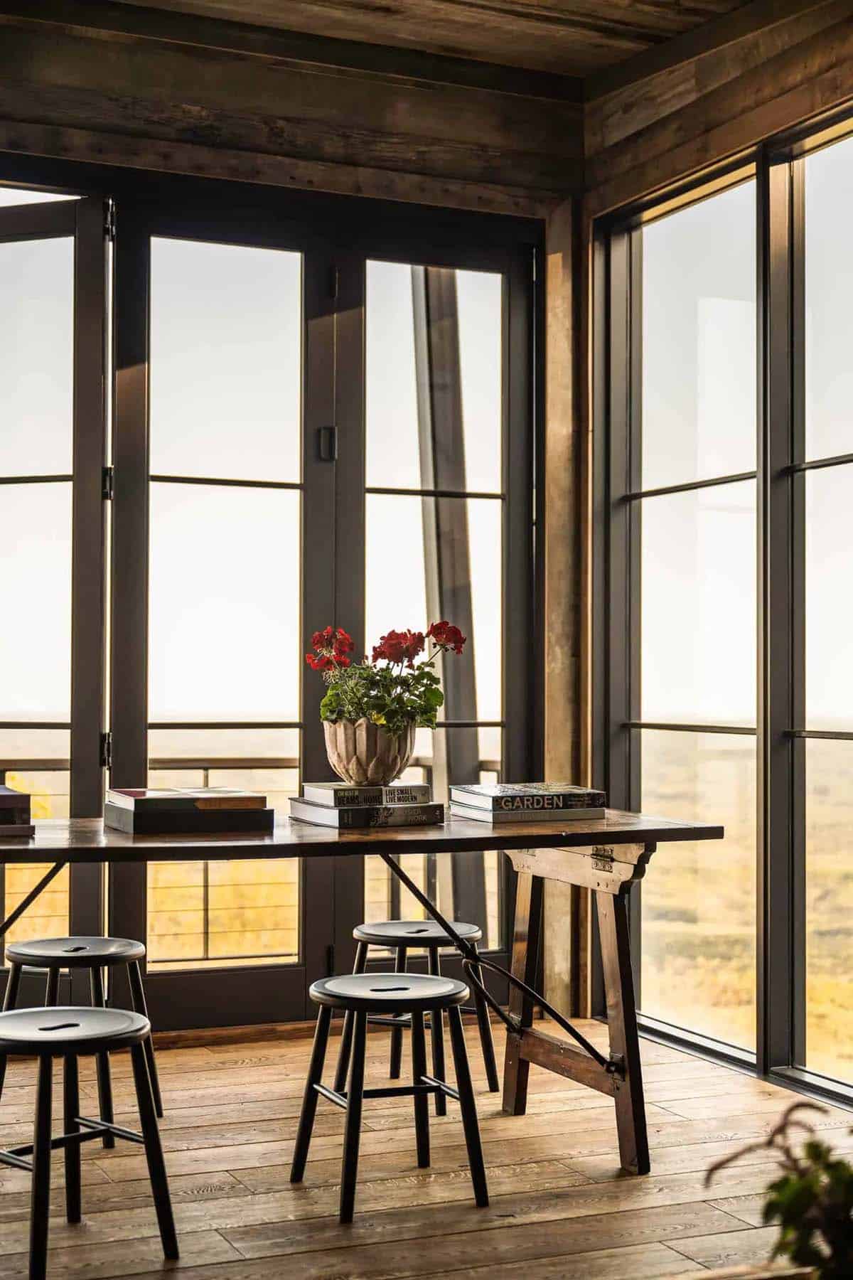 modern rustic screened porch with outdoor dining