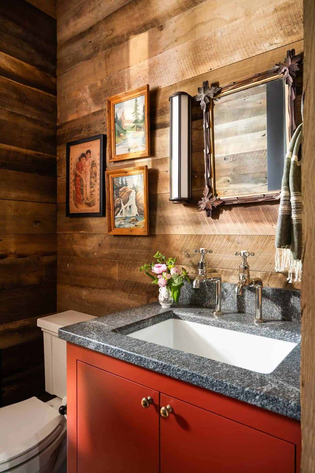 modern rustic bathroom with a red painted vanity