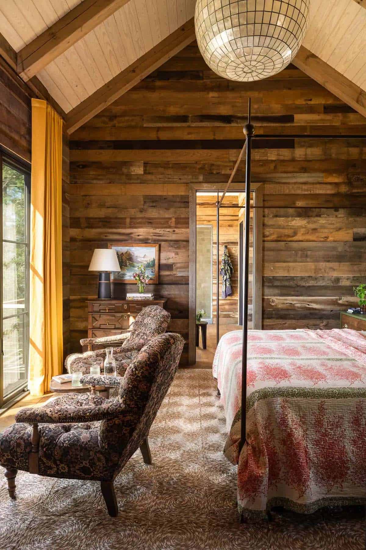 modern rustic bedroom with a sitting area