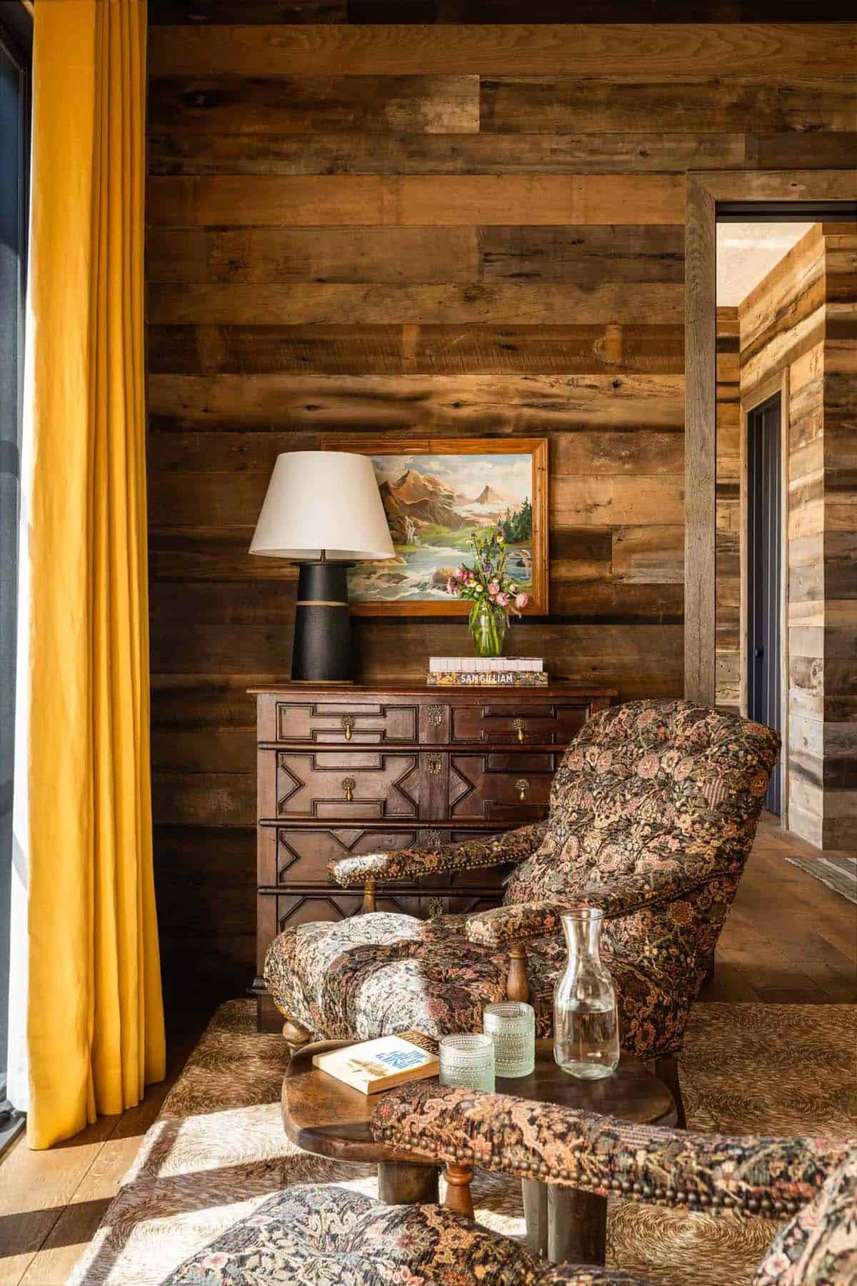 modern rustic bedroom with a sitting area
