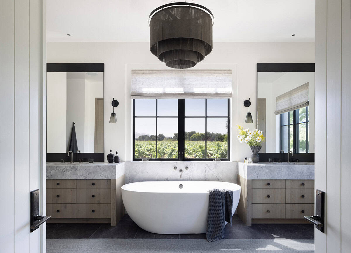 modern farmhouse style bathroom with a freestanding tub