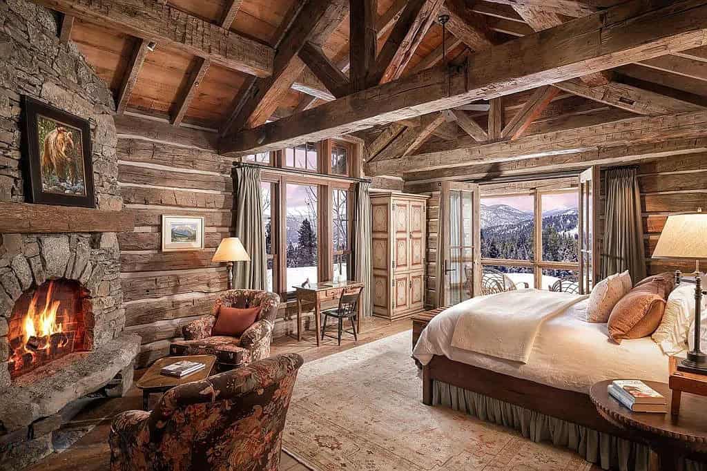 rustic bedroom with a fireplace