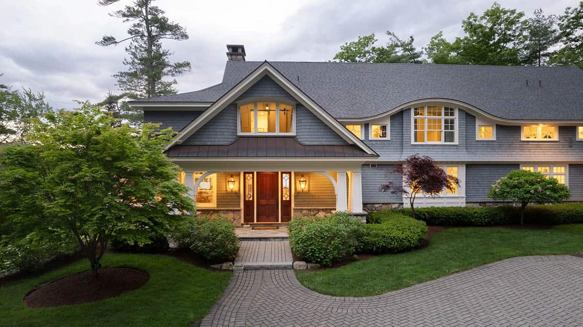 new england shingle style lake house exterior