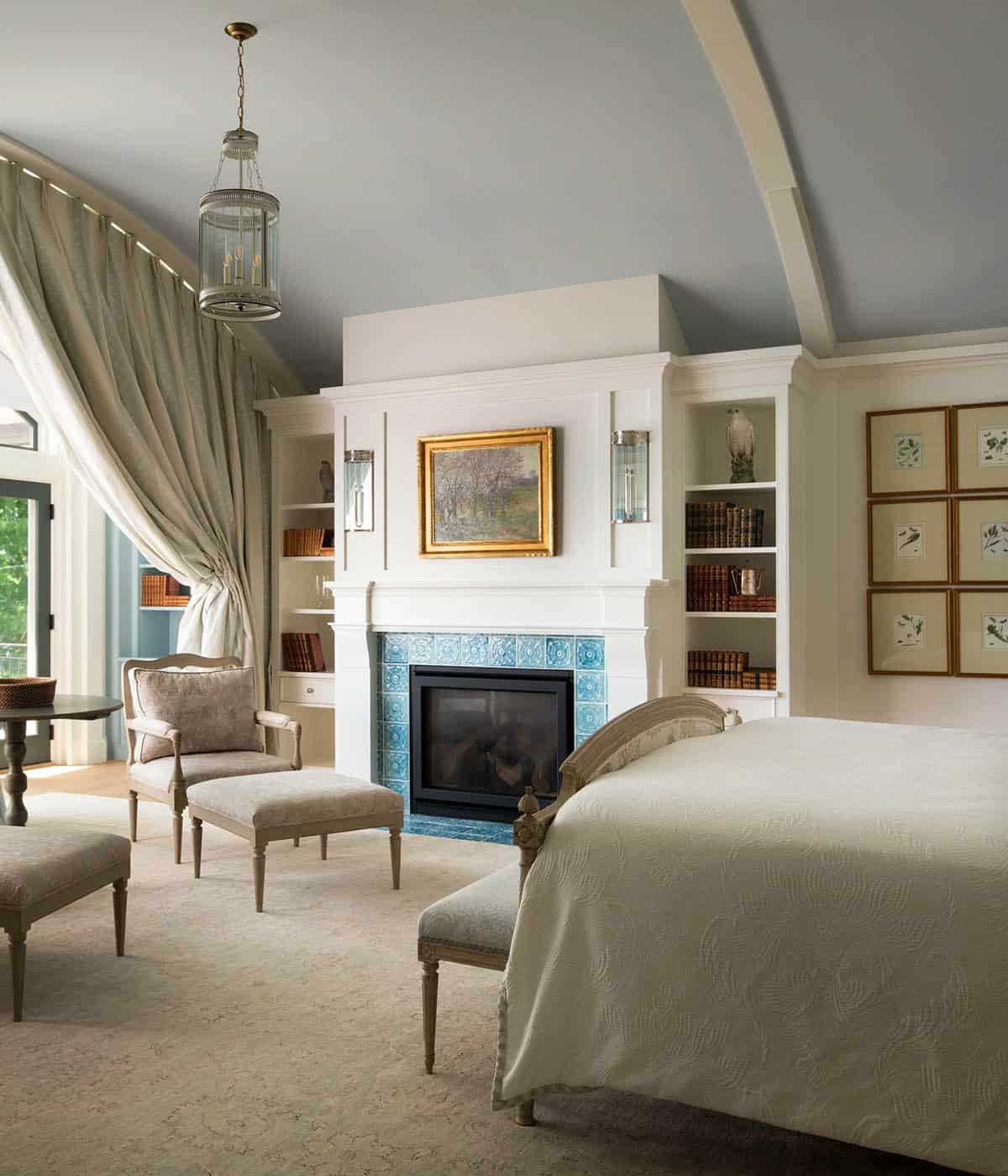 contemporary bedroom with a fireplace