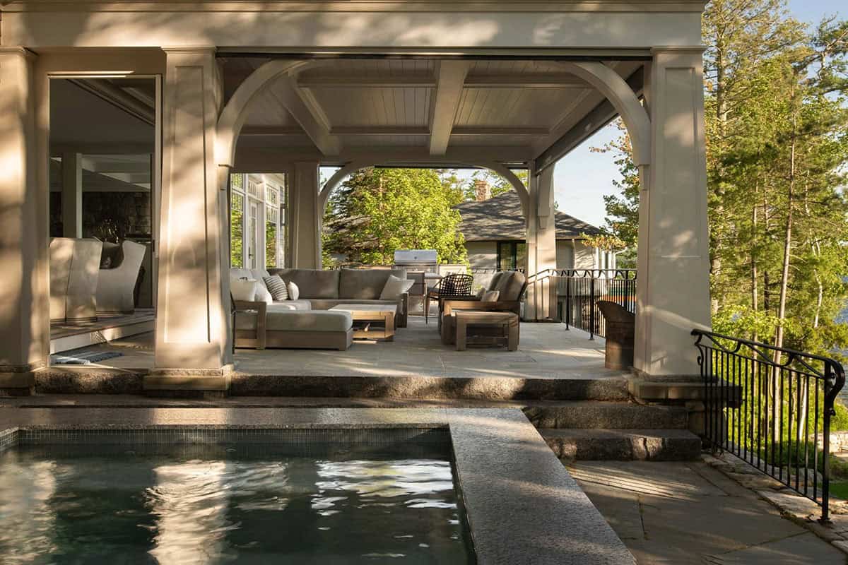 contemporary covered porch with outdoor furniture