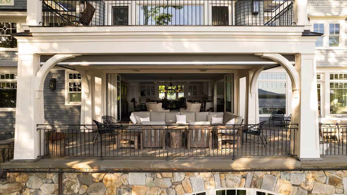 contemporary covered porch with outdoor furniture