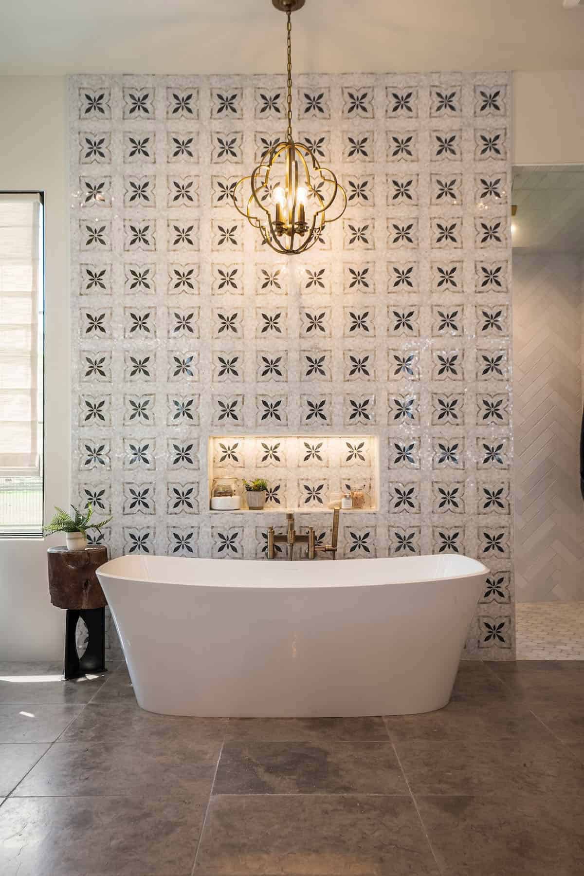 modern rustic bathroom with a freestanding tub and tile backsplash