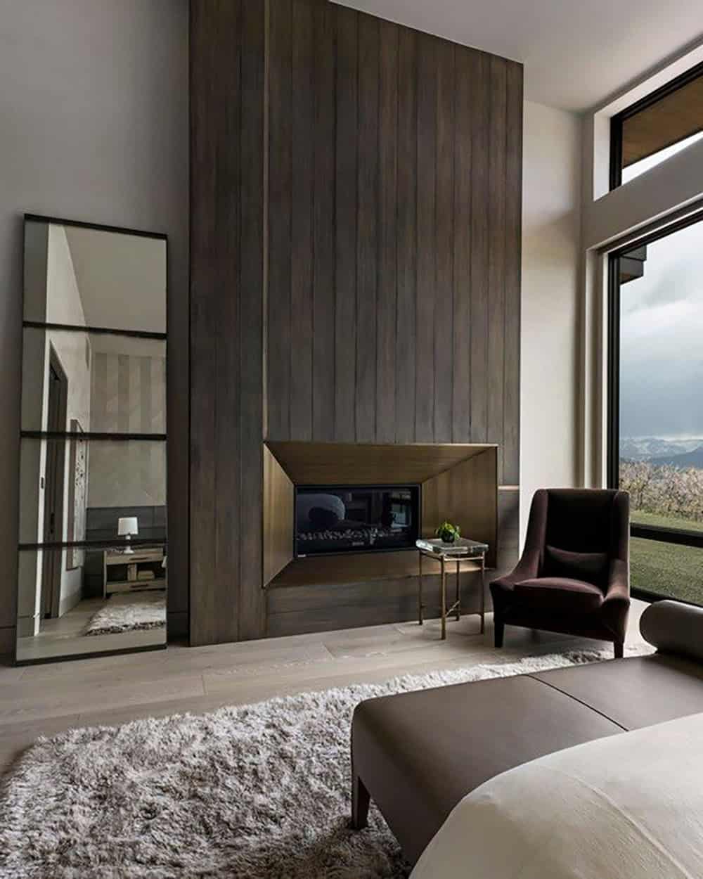 organic modern bedroom with a fireplace