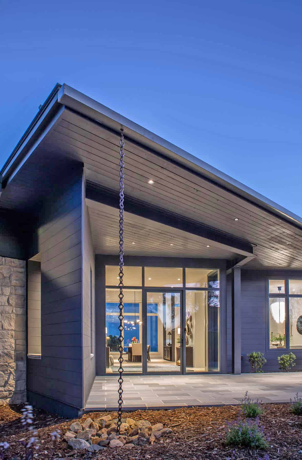 mountain modern home exterior at dusk