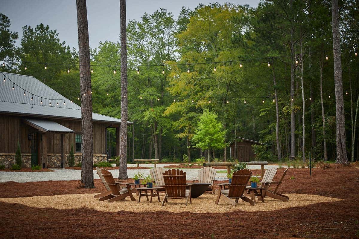 rustic modern barn house exterior backyard with a fire pit