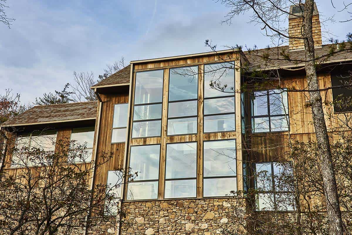 rustic modern mountain home exterior backyard view