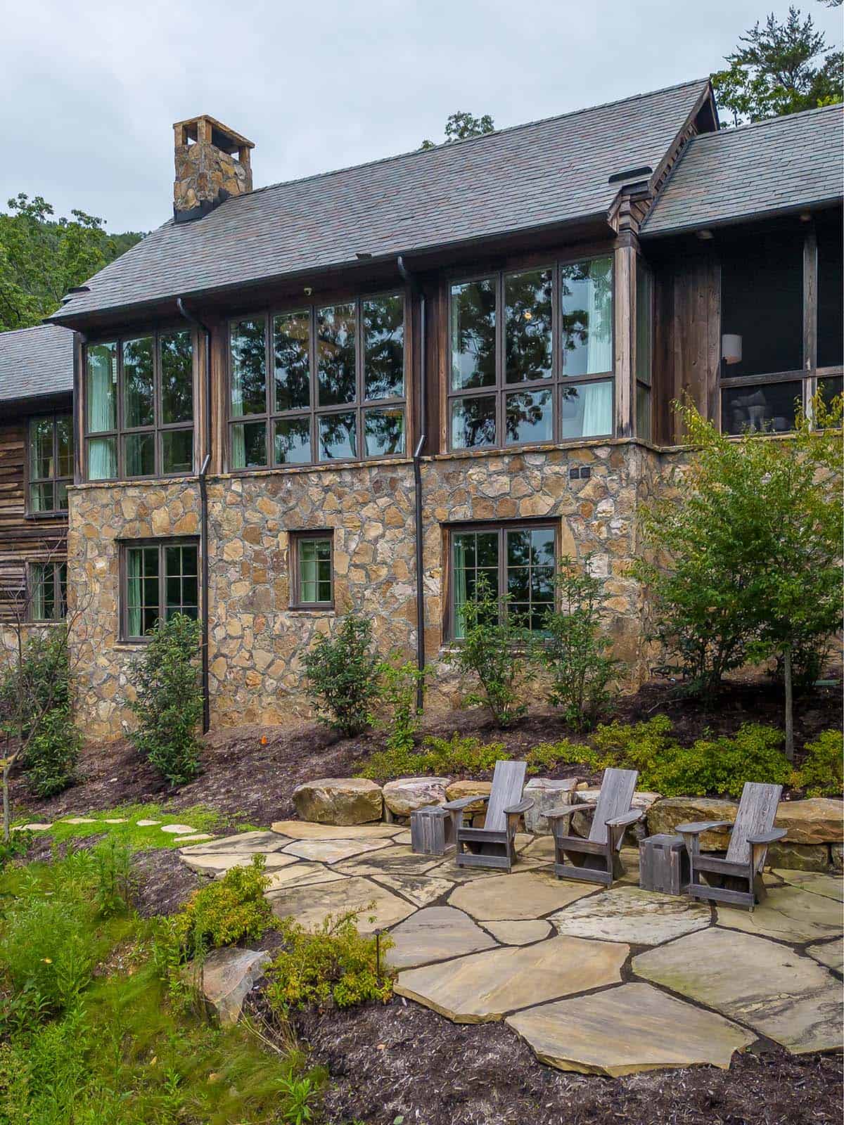 rustic modern home exterior backyard view