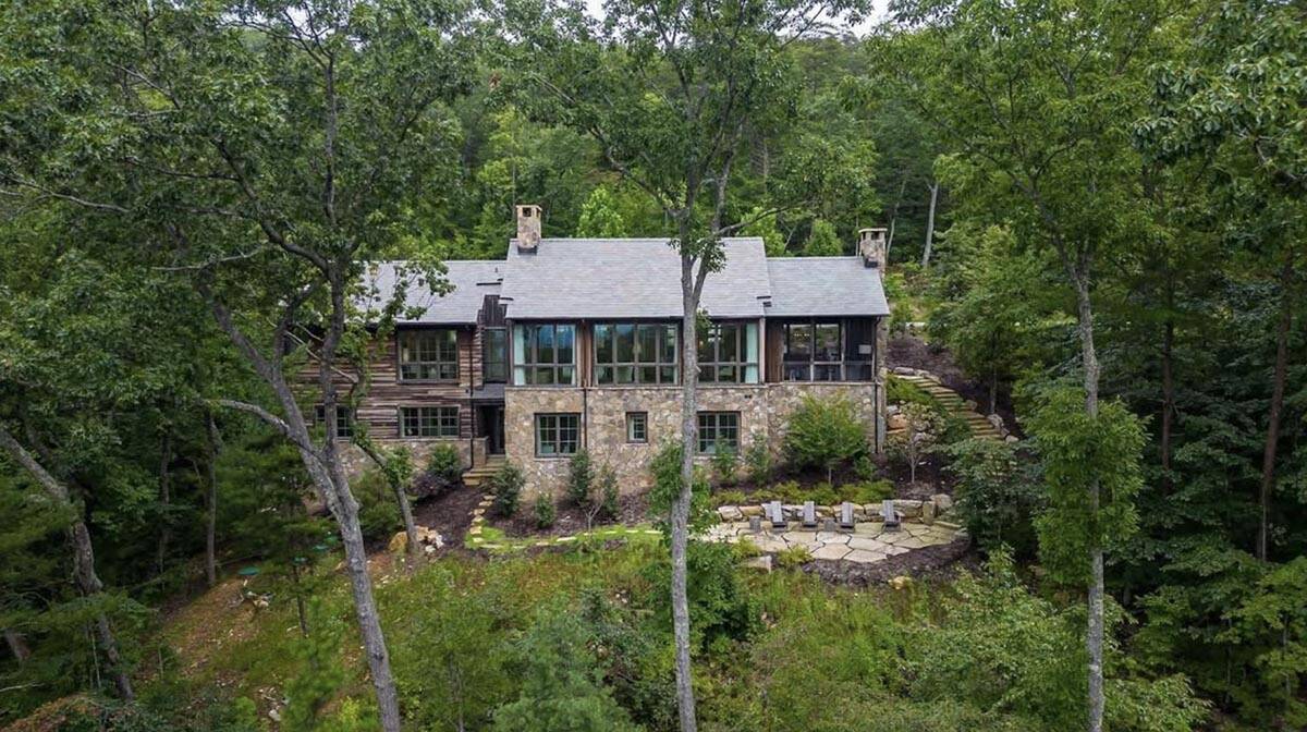 rustic modern home exterior backyard view