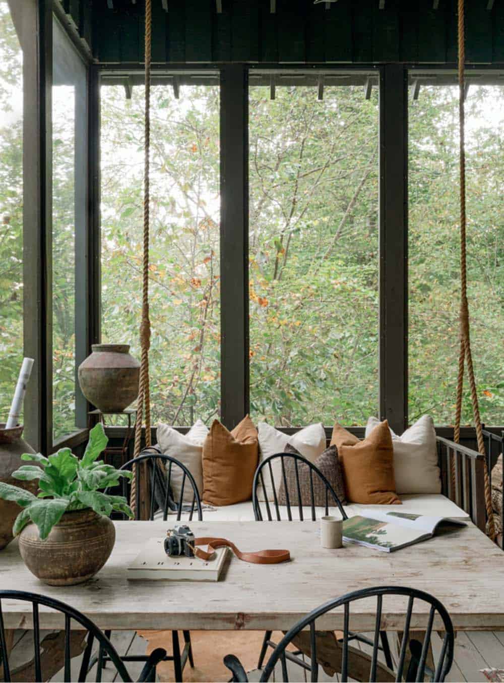 farmhouse style screened porch overlooking the river
