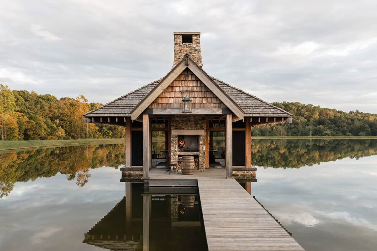 boardwalk over the lake leading to a pavillion