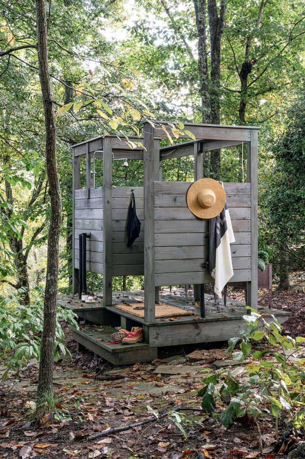 rustic outdoor shower in the woods
