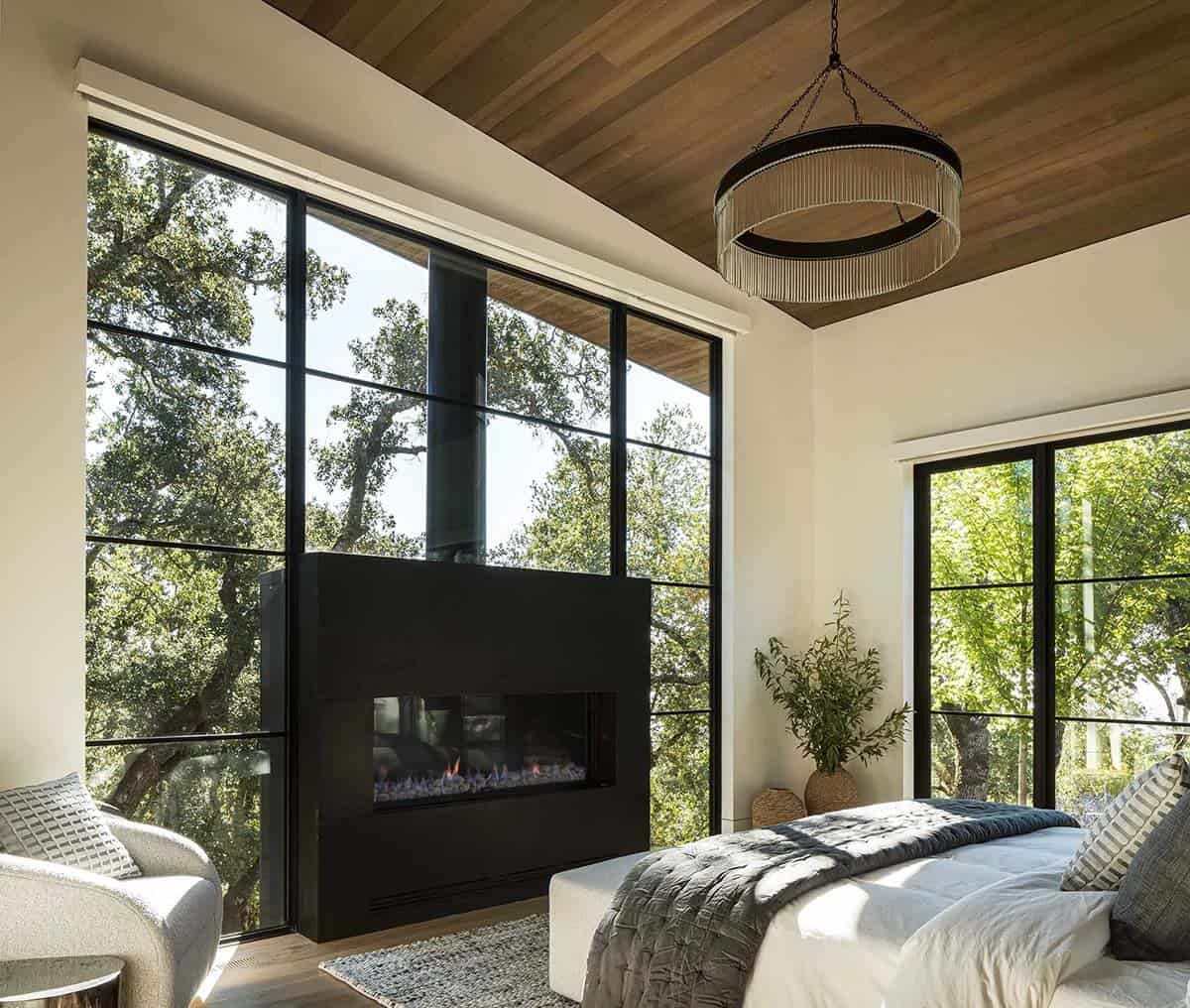 modern bedroom with a fireplace