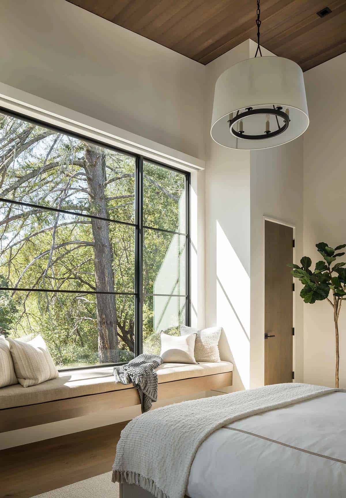 modern bedroom with a built-in window seat