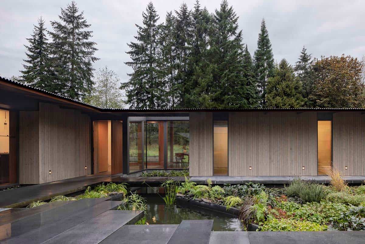 modern home exterior with a water feature