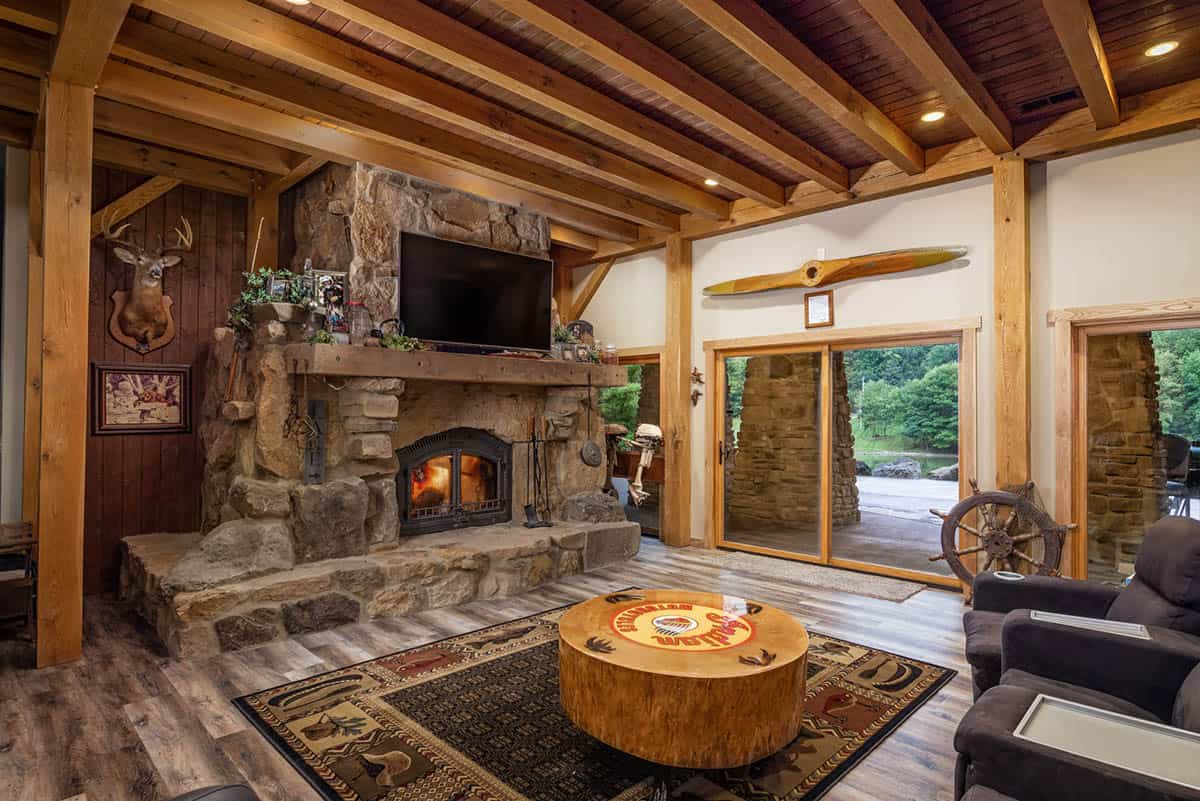 rustic family room with a fireplace