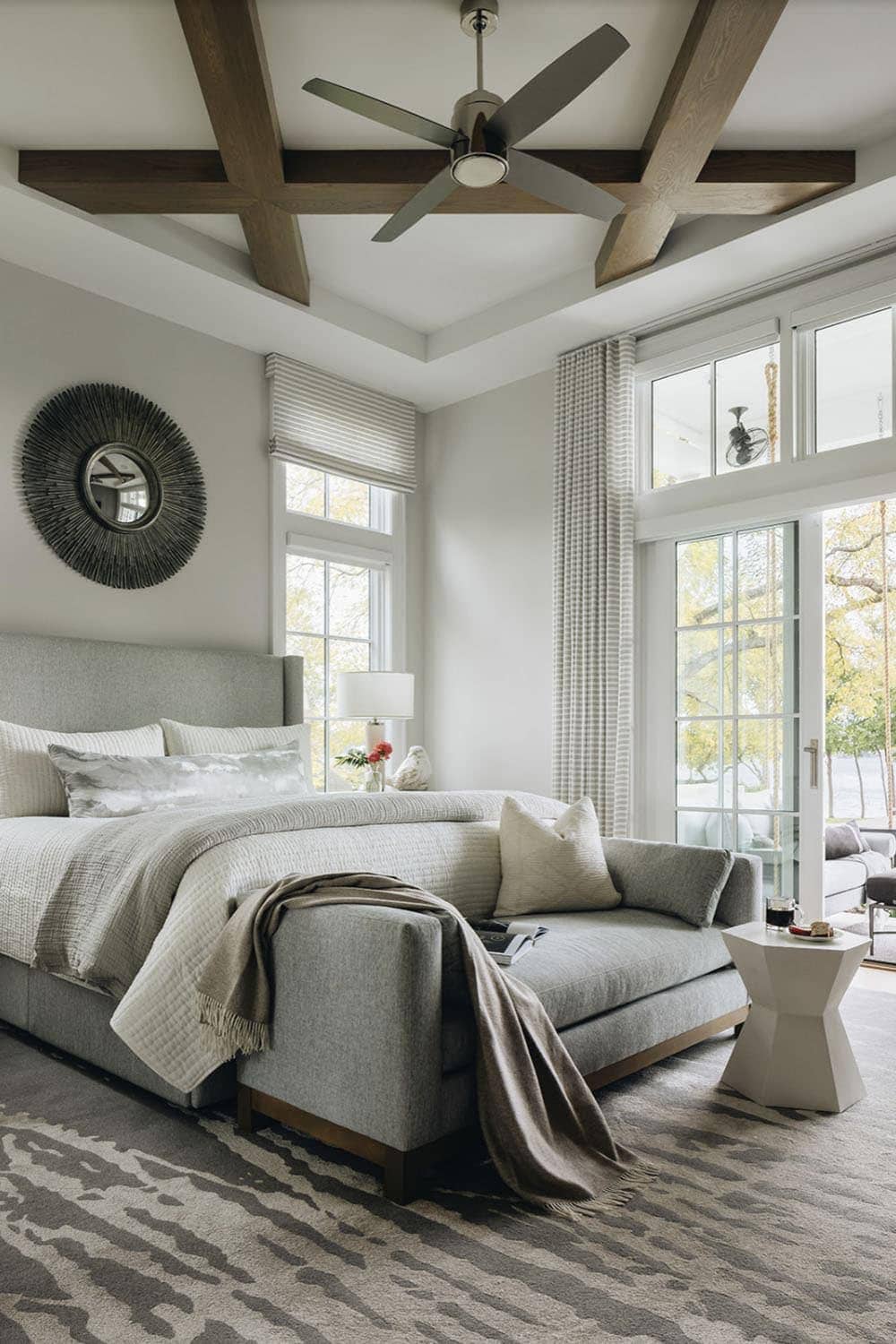 transitiional style bedroom with large windows