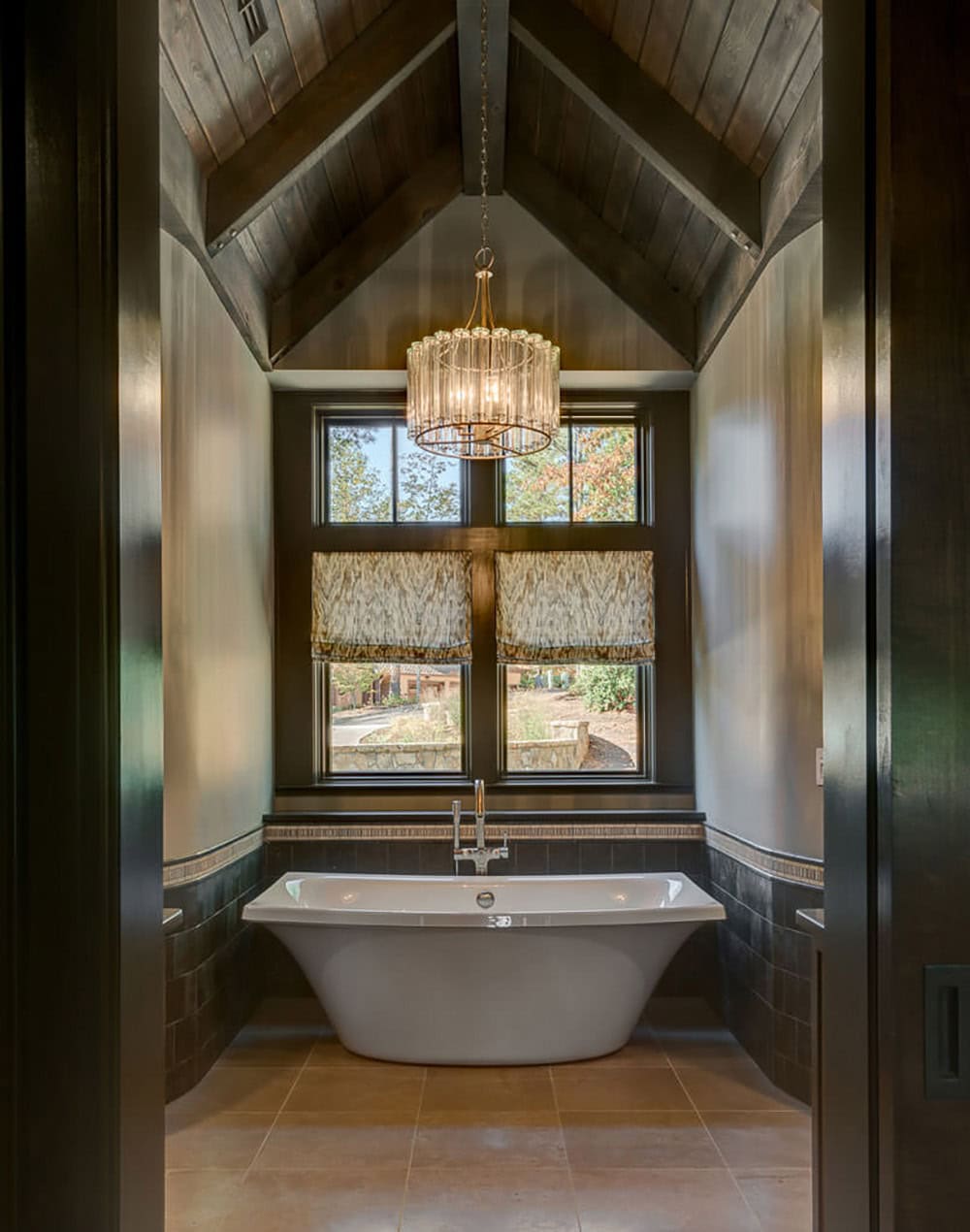 modern rustic bathroom with a freestanding tub