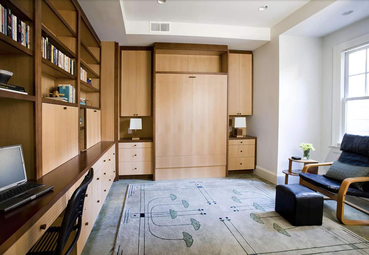 contemporary basement bedroom with built-in home office and murphy bed