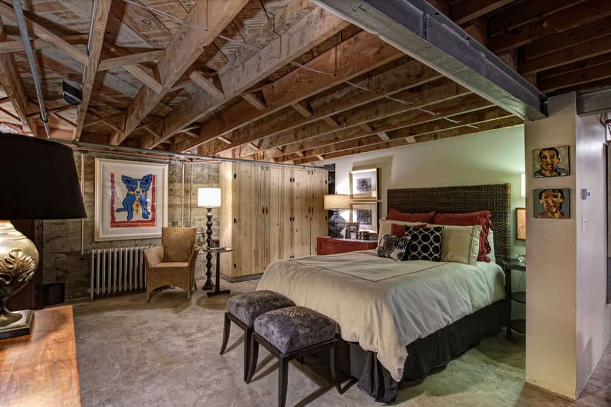 Eclectic Basement guest bedroom with exposed ceiling joists