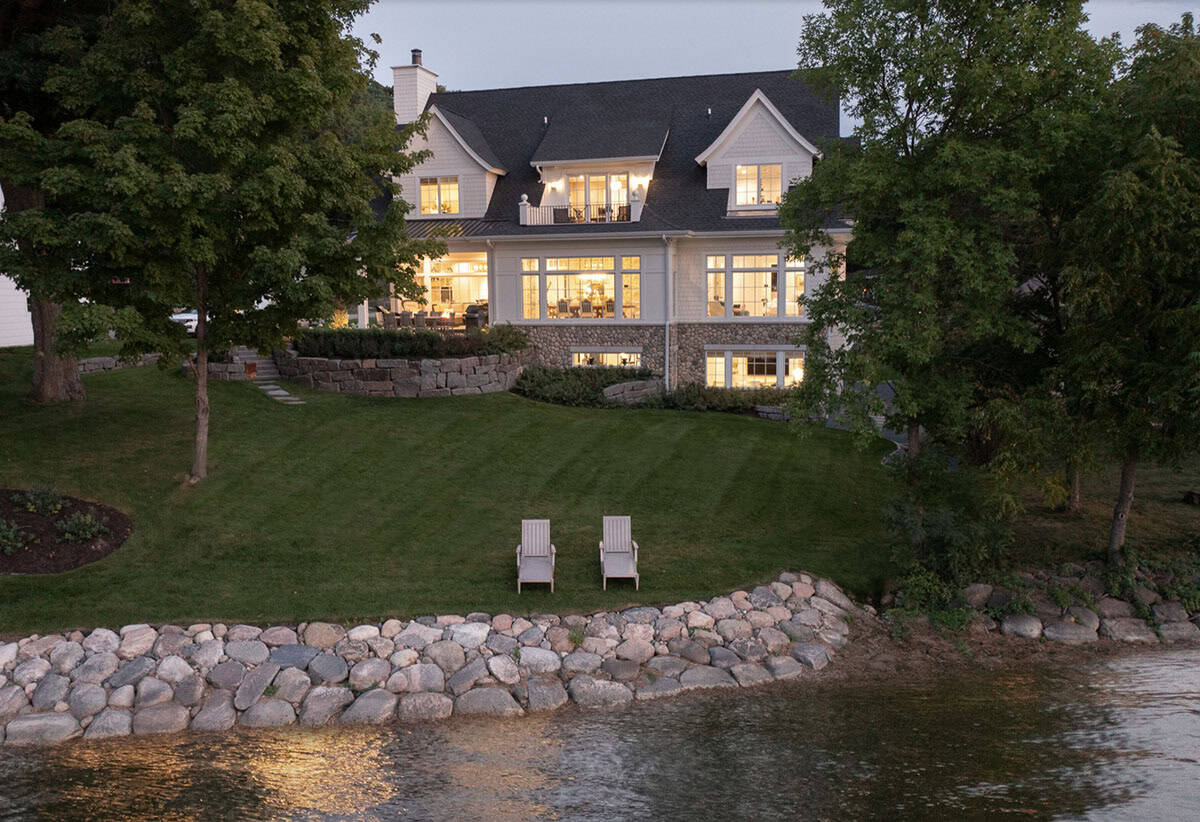 Beach Style Home Exterior at dusk