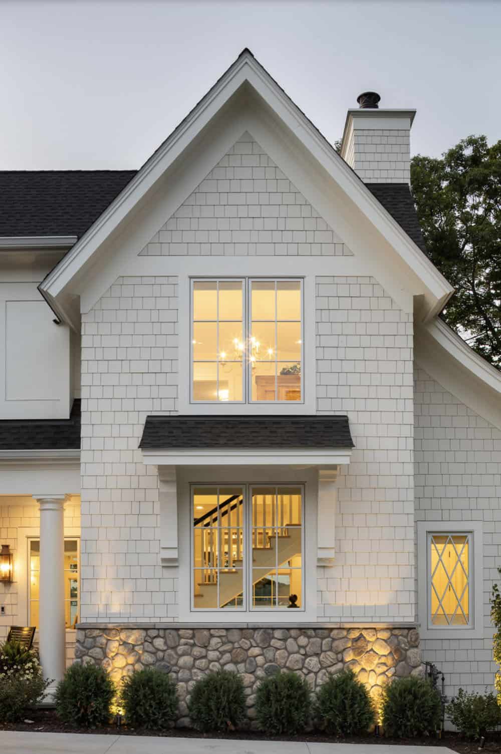 Beach Style Home Exterior at dusk