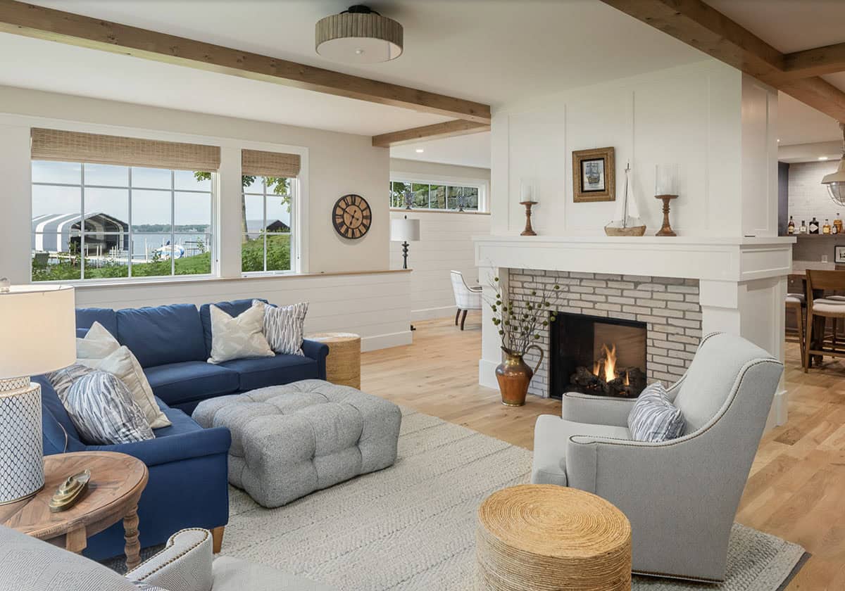 Beach Style Basement Family rRom with a fireplace