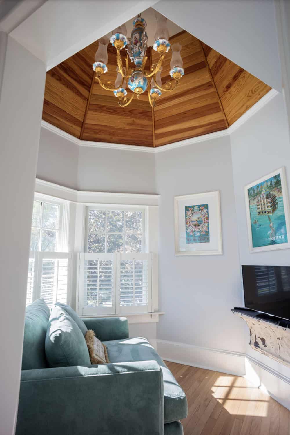 beach style bedroom sitting area with a turret