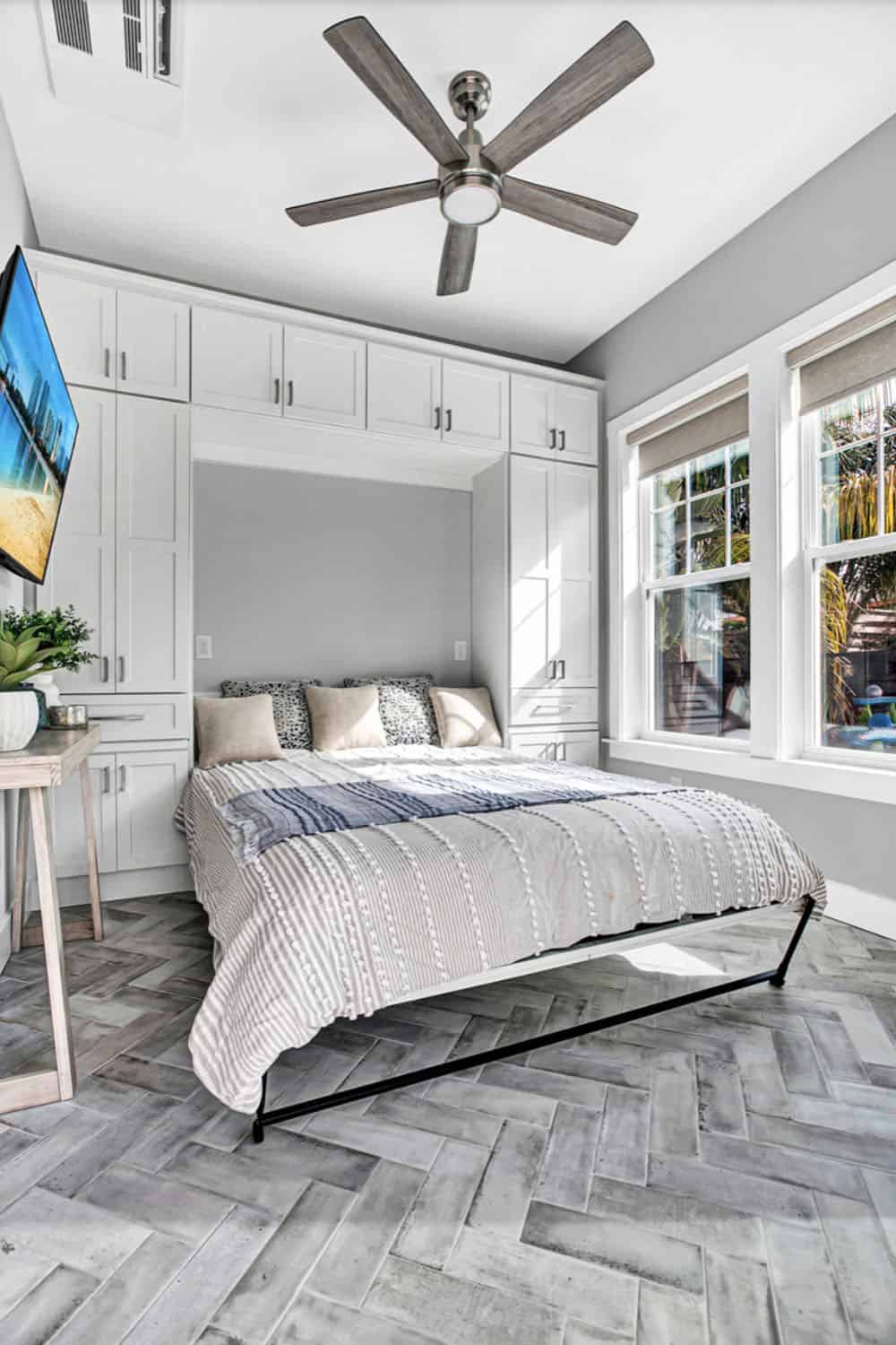 Beach Style Sunroom with a murphy bed