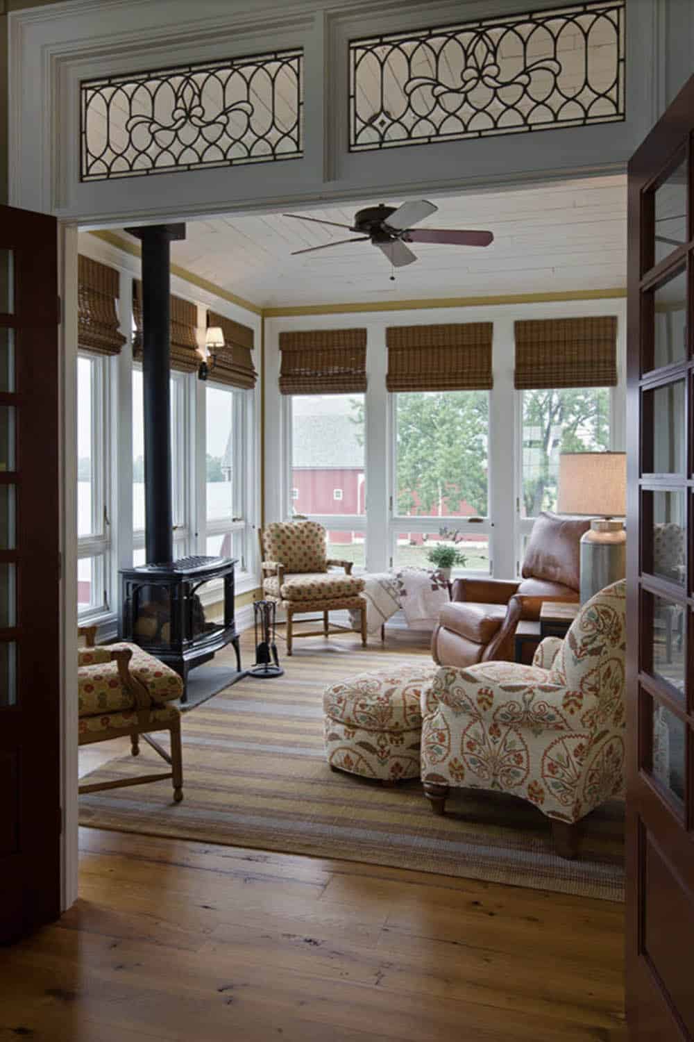 Farmhouse Style Sunroom with a fire stove