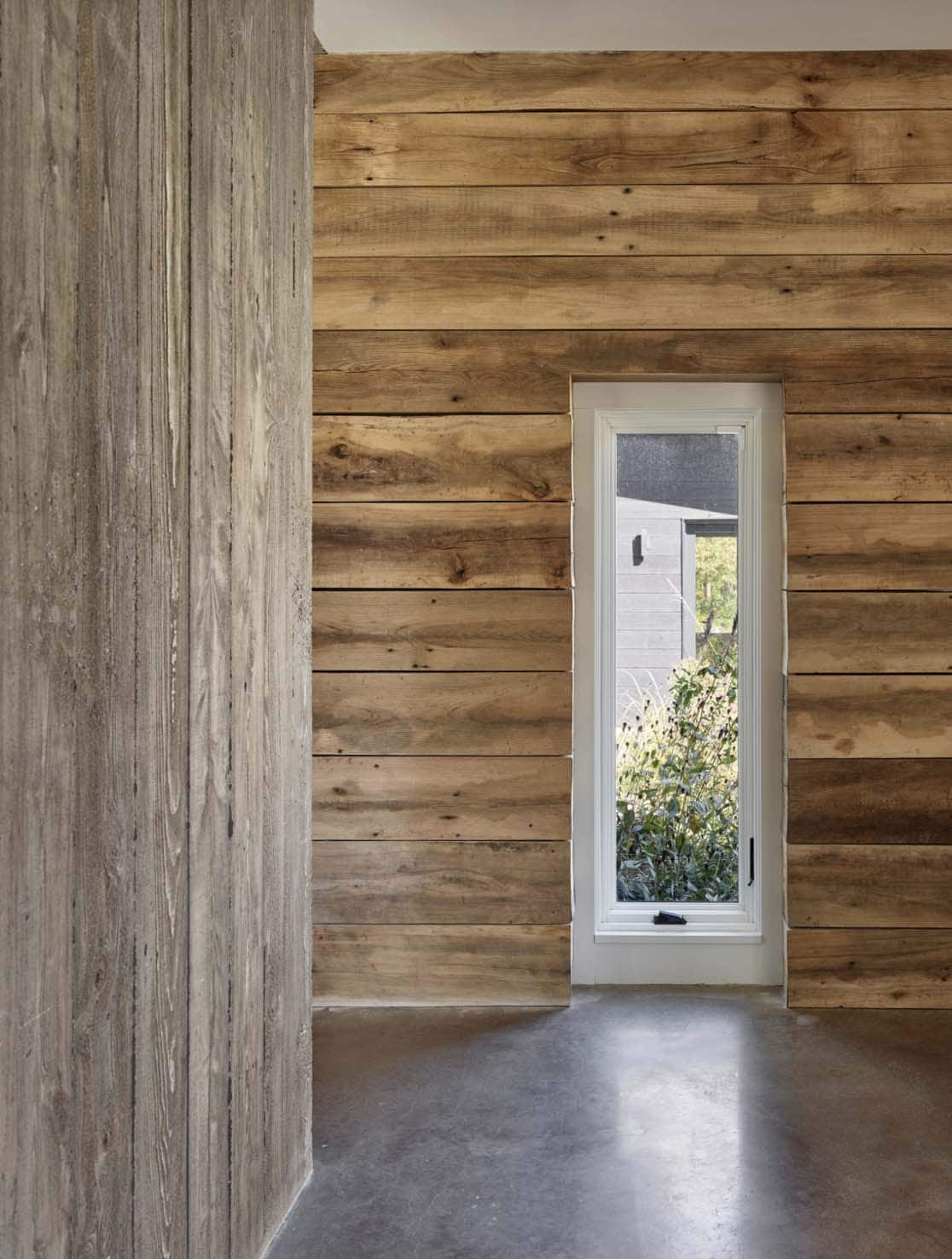 modern barn house wall detail with a window
