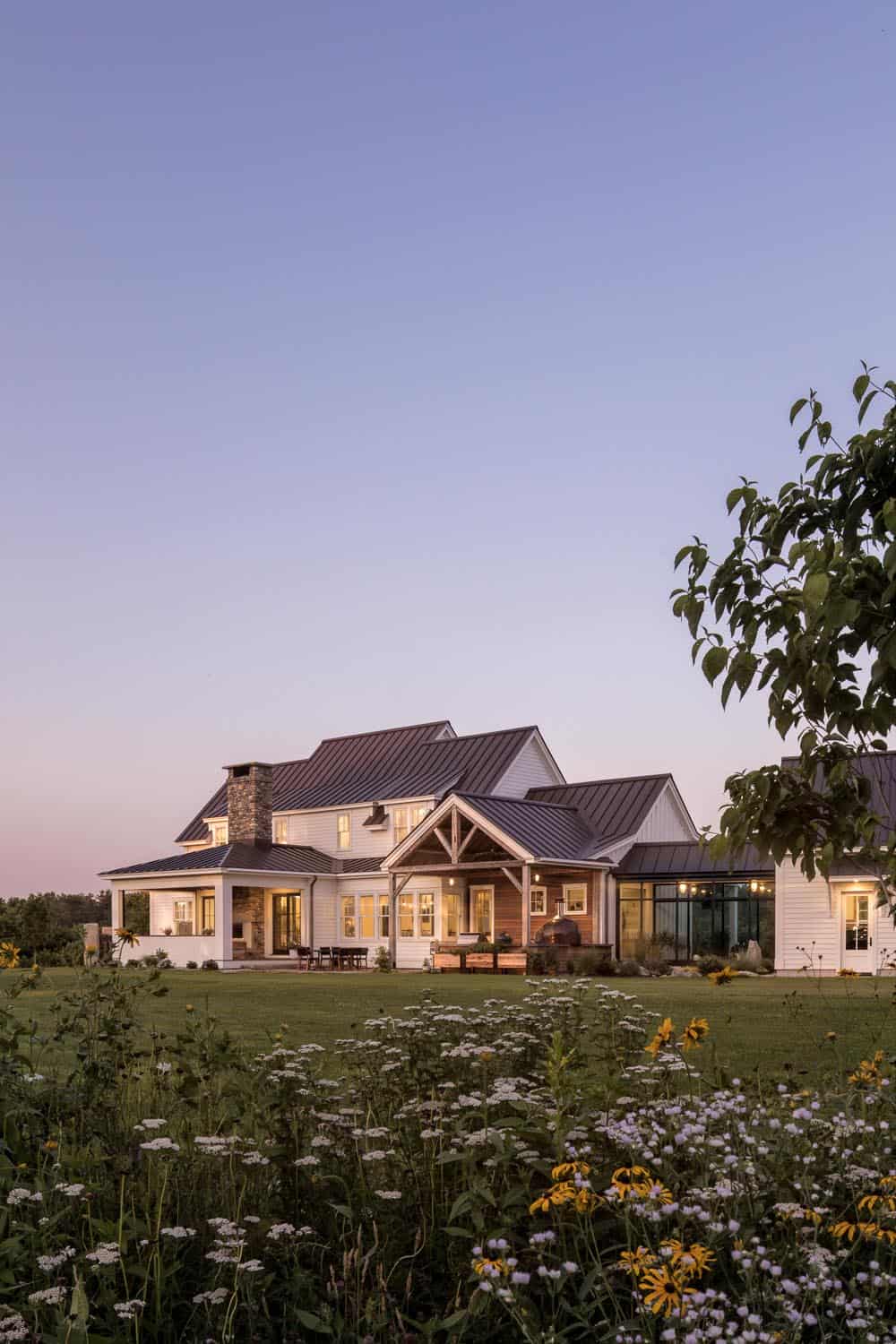 coastal farmhouse exterior at dusk