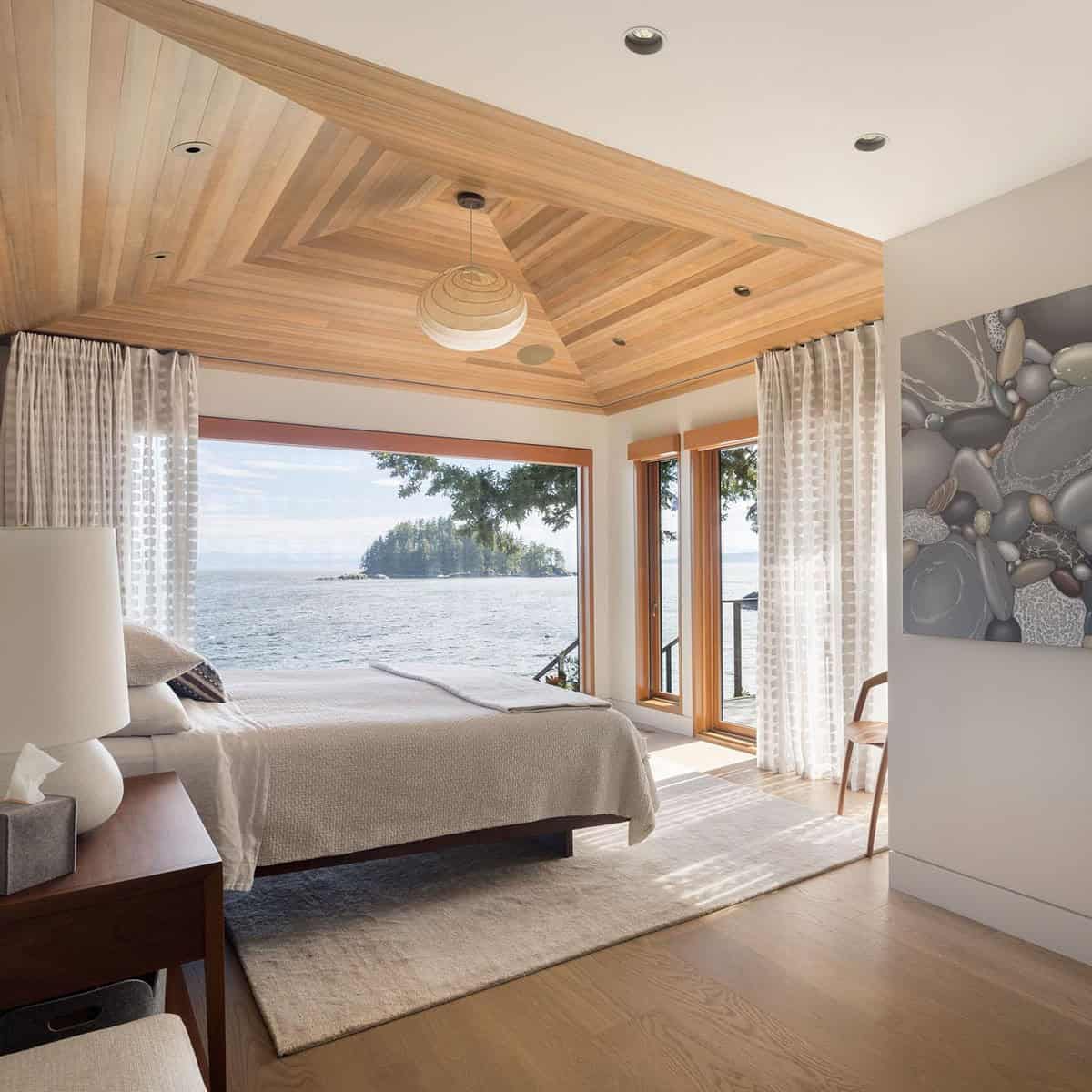 coastal modern bedroom with a large window